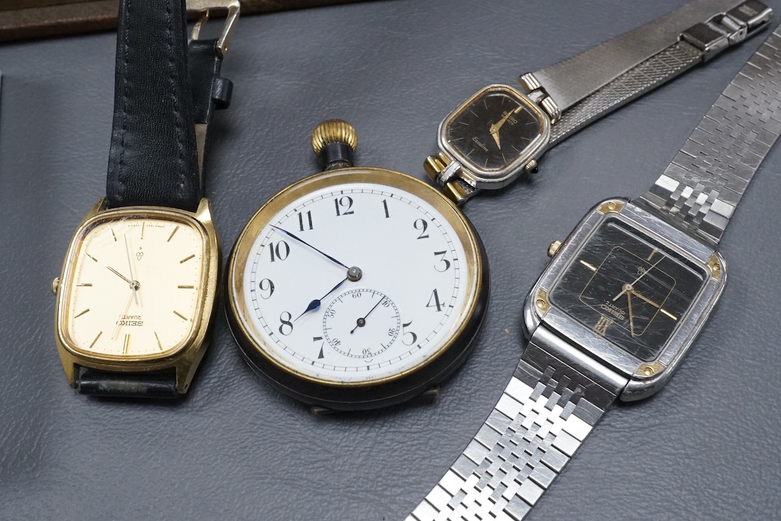 An early 20th century Photograph album of European views and a group of watches